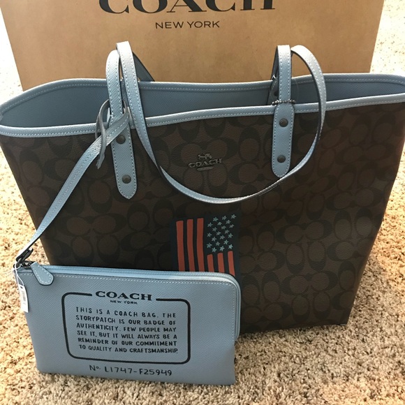 reversible city tote in signature canvas